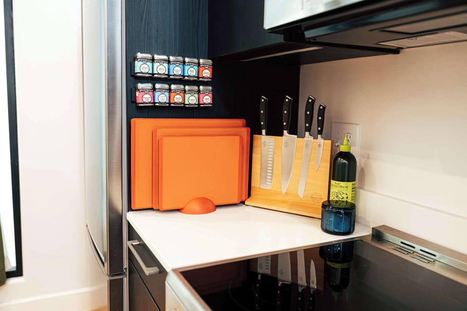The heart of the loft includes all the quality tools you need for simple meals or craft cocktails.