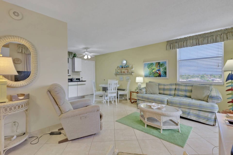 The easy, relaxing furnishings feature a sleeper sofa and a powered recliner, perfect for kicking your feet up after a day at the beach.