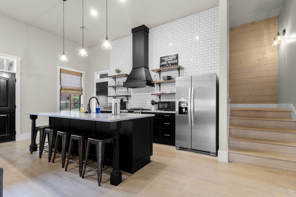 Fully stocked open concept kitchen, located on the entry level