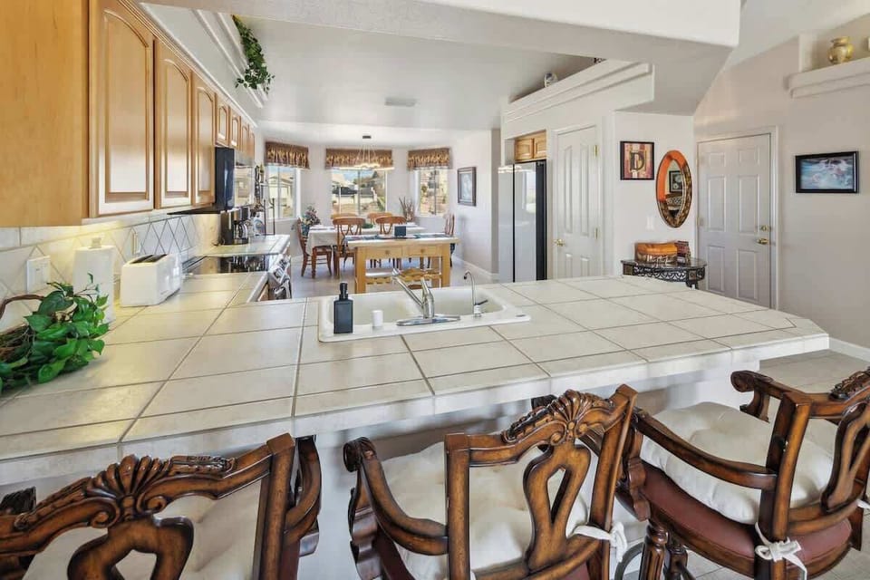 The open, airy kitchen offers ample space & all the comforts of home. 