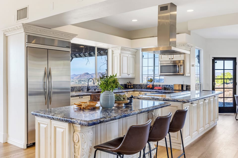 Kitchen with barstool seating.