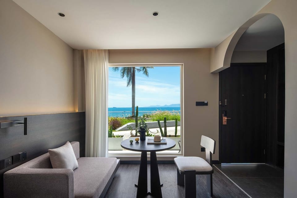 Superior Twin Room, Patio, Sea View | Living area