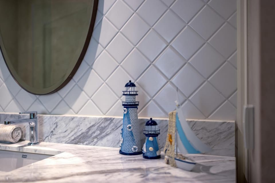 Condo, 2 Bedrooms, Balcony, Pool View | Bathroom | Towels, toilet paper