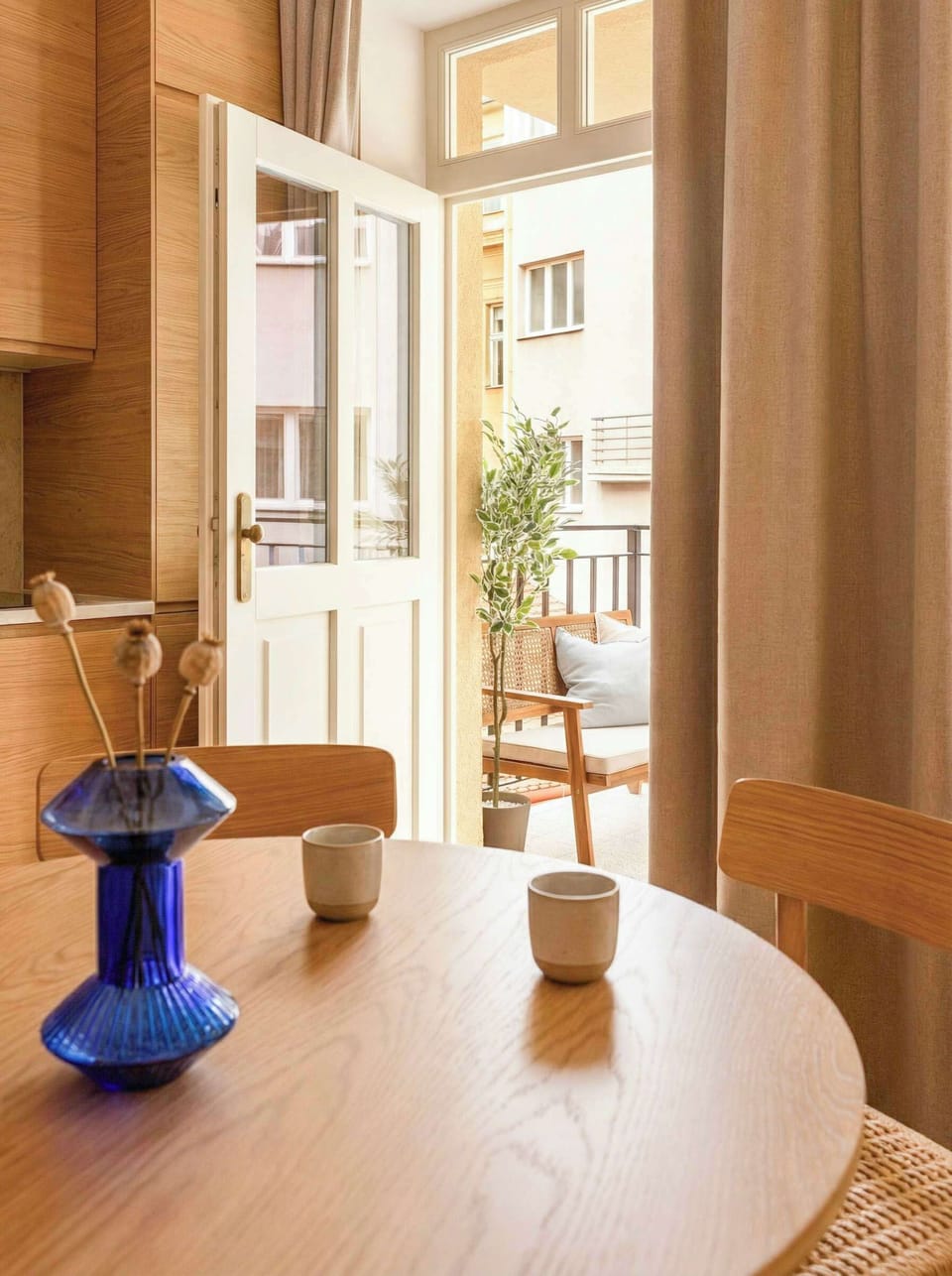 Dinning table and entrance to the apartment
