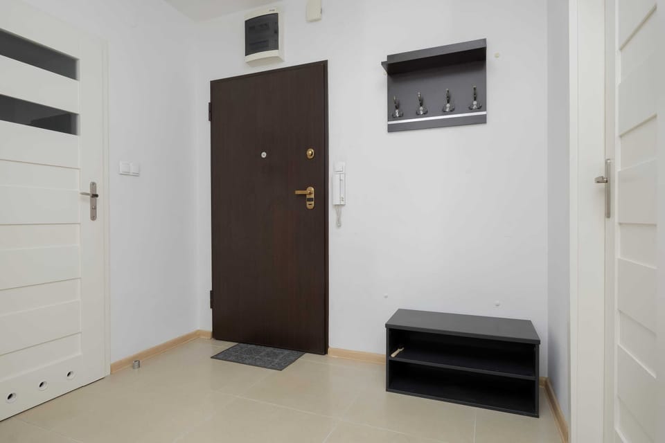 A bright hallway with access to the corridor.