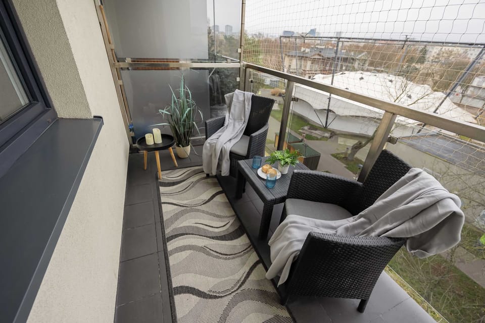 Balcony angle with outdoor lounge chairs
