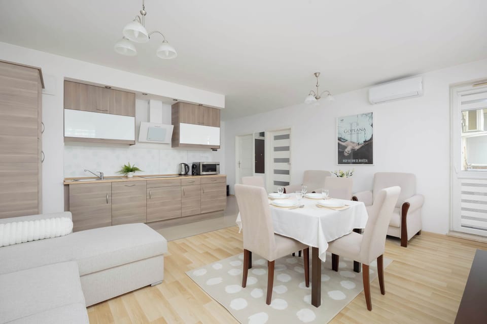 Another view of the bright living room with modern décor