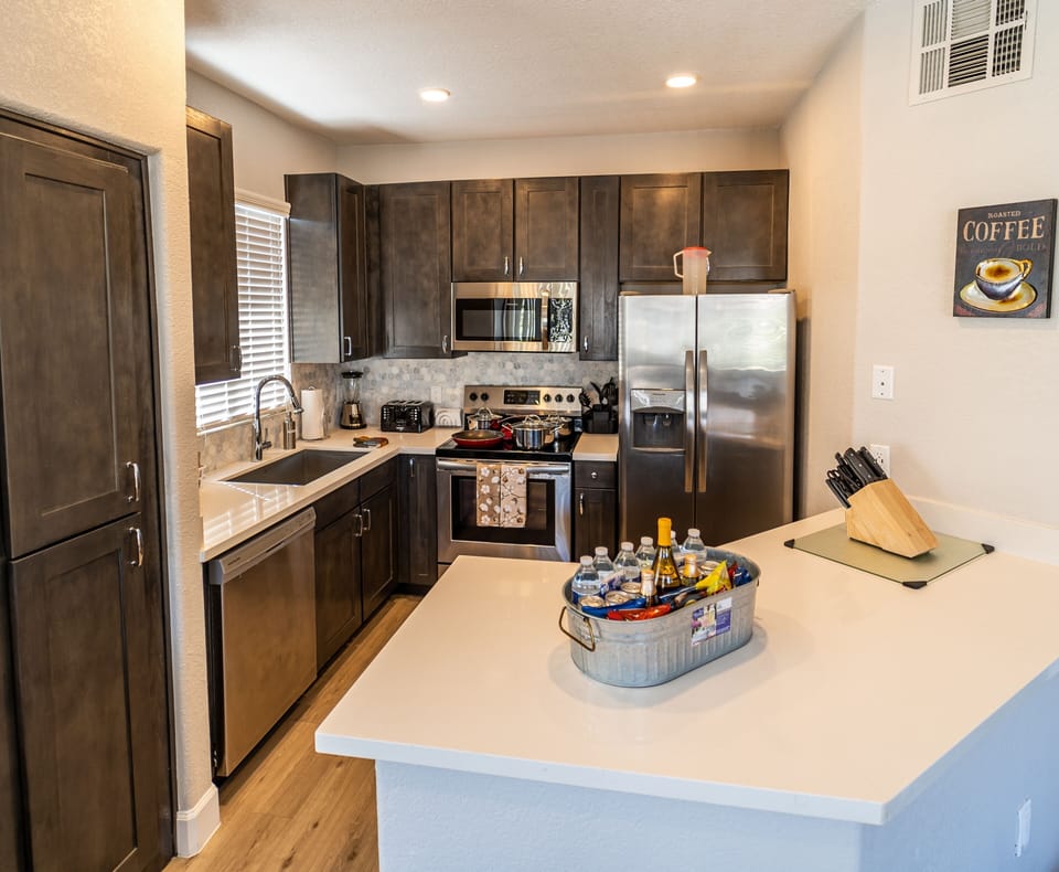 Fully equipped kitchen with plates, utensils, coffee maker and much more!