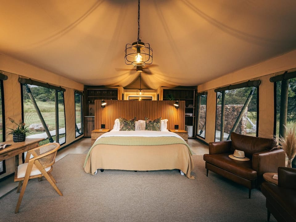 Hideout Luxury Tent | Desk, laptop workspace, blackout drapes, iron/ironing board