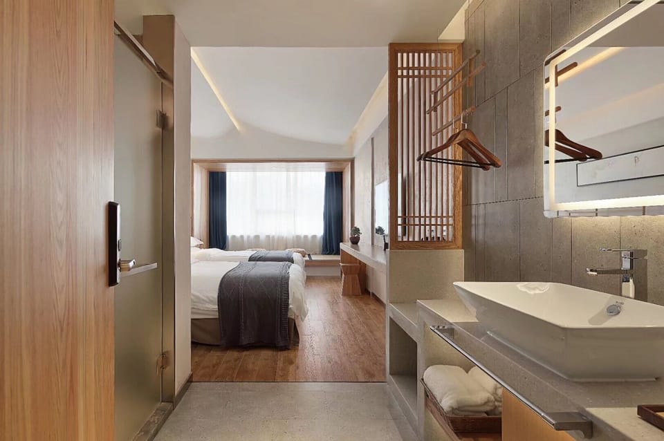 Classic Twin Room | Down comforters, desk, laptop workspace, blackout drapes