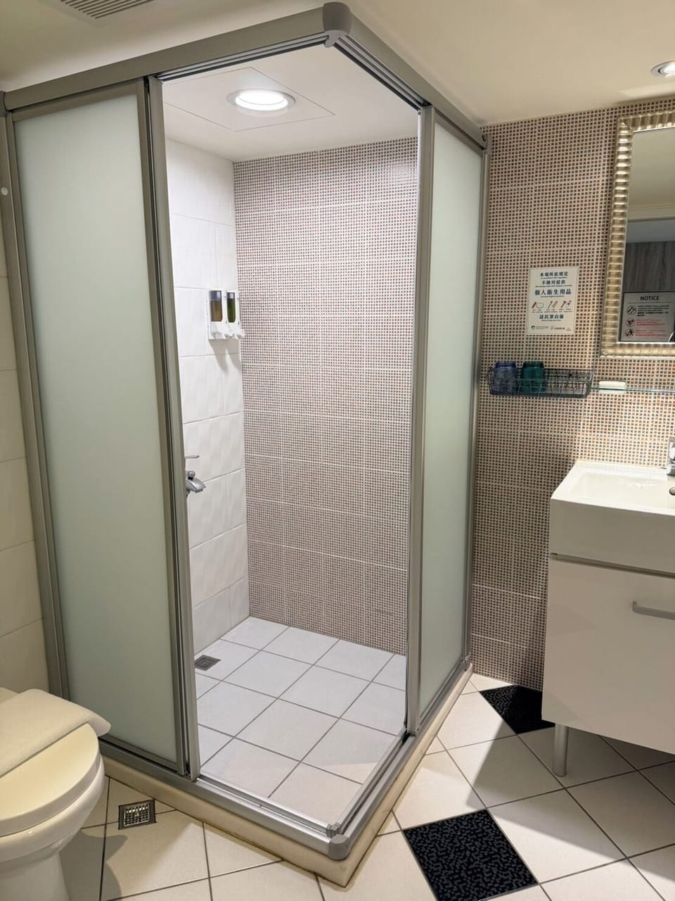 Shower, hair dryer, slippers, towels