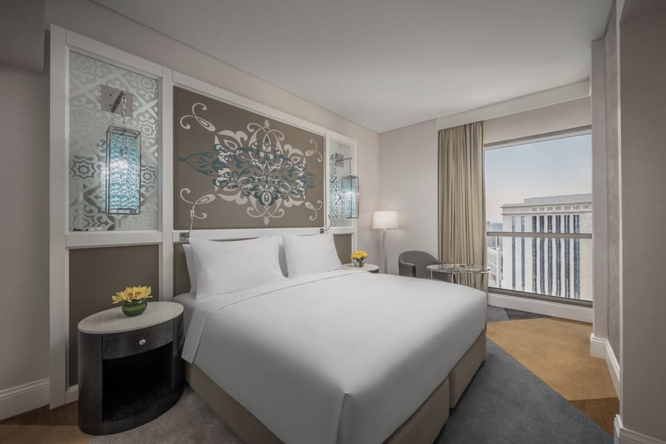 Room, 1 King Bed (Guest Room) | Down comforters, minibar, in-room safe, blackout drapes