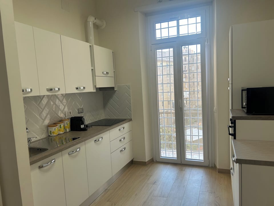Apartment (1 Bedroom) | Private kitchen | Microwave, stovetop, dishwasher, espresso maker