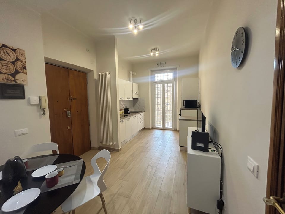 Apartment (1 Bedroom) | Living area | 32-inch flat-screen TV with cable channels