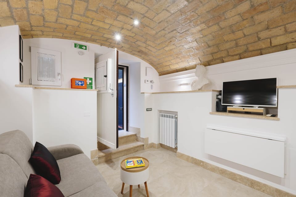 Apartment (1 Bedroom) | Living area | TV