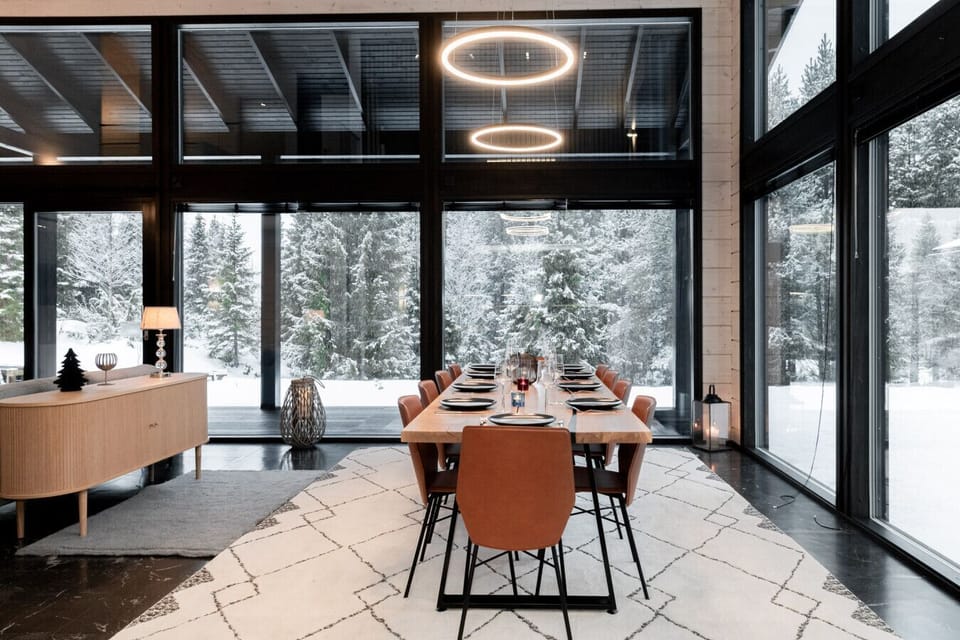 A cozy dining area with a large table, perfect for family meals.