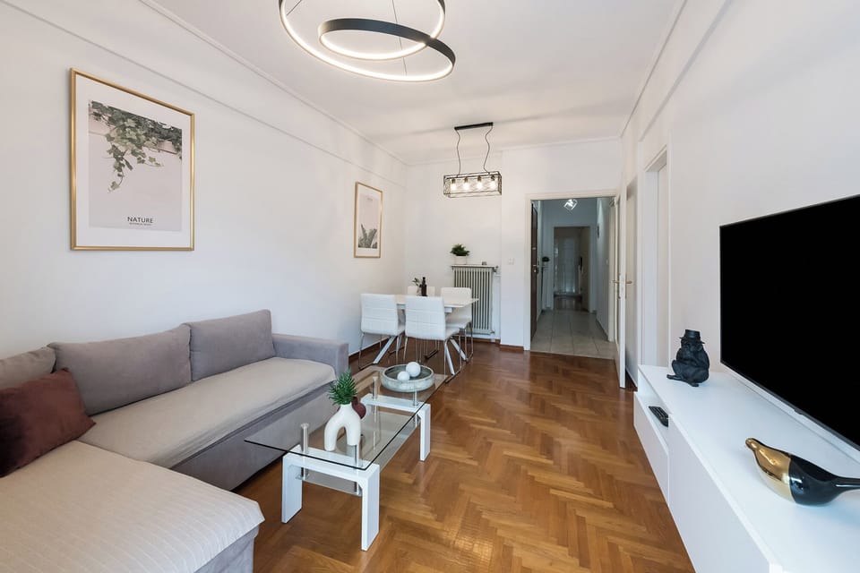 Apartment, 3 Bedrooms | Living area | Flat-screen TV