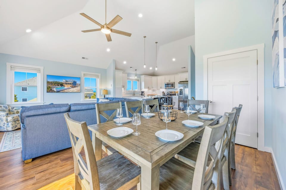 Your bright, airy dining space seamlessly flows into the modern kitchen, perfect for memorable meals together.
