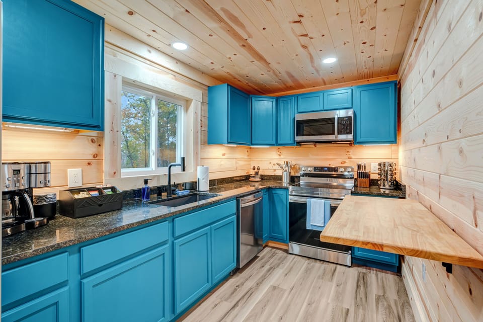 Wake up to the smell of fresh coffee in this charming kitchen.