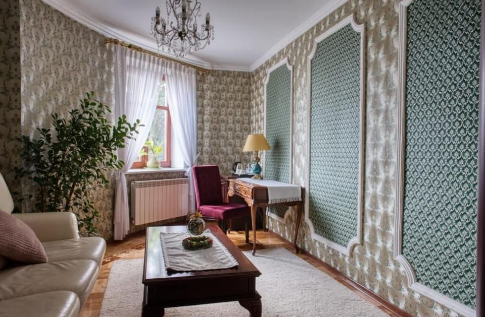 Deluxe Apartment, Non Smoking, Garden View | Living area | TV