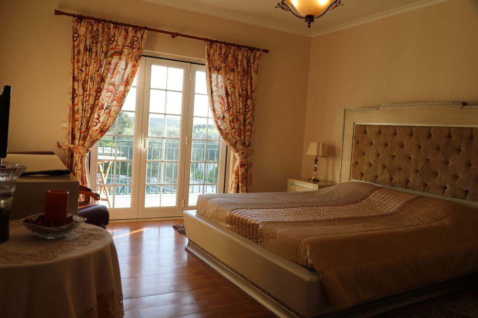 Deluxe Room, Balcony, Pool View | Minibar, WiFi (free)