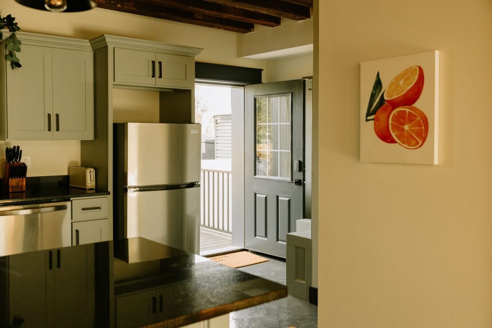 The rear entrance to the kitchen is the easiest way into the property.