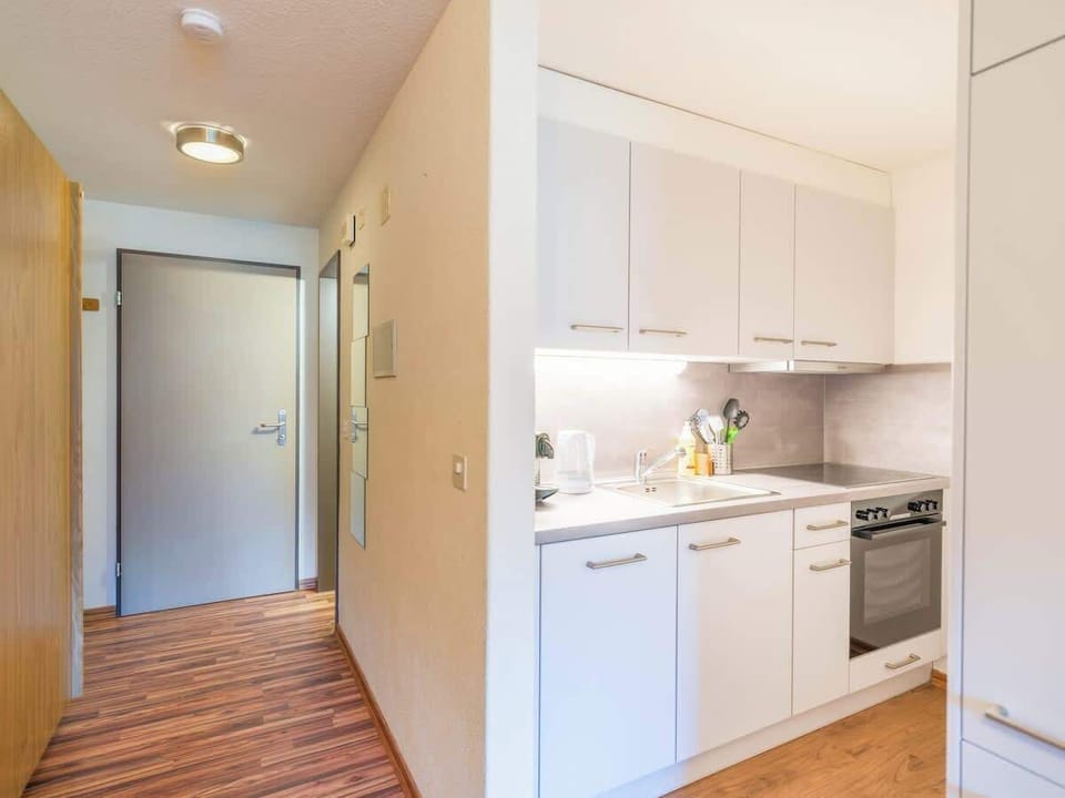Bright kitchenette with clean layout