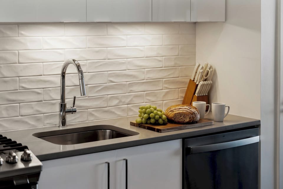 This bright kitchen offers top-notch appliances and thoughtful touches.
Designed for ease and everyday enjoyment.