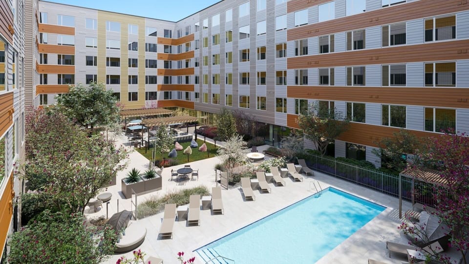 Scenic view including our full building, pool and courtyard. Well curated.
