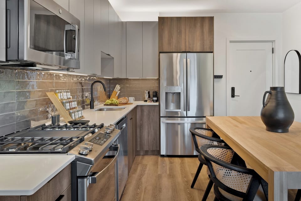 Modern kitchen meets cozy dining for the perfect shared space.
Enjoy meals, conversations, and connection all in one place.