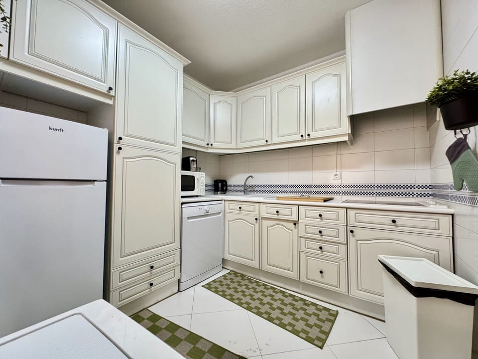 Microwave, dishwasher, coffee/tea maker, cookware/dishes/utensils