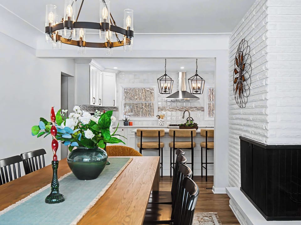 Dining area w/ centerpiece decor & bright, airy layout