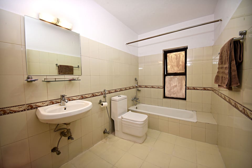 Shower, free toiletries, hair dryer, slippers