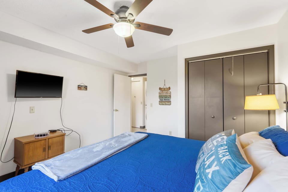 This cozy bedroom retreat includes a plush king bed & smart TV​