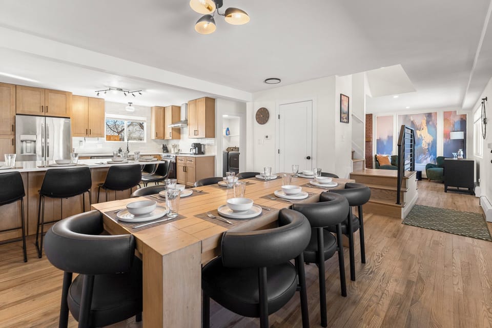 Main floor kitchen and dining room with comfortable seating for 14.