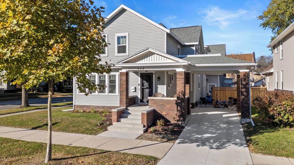 Charming front exterior w/ off-street parking for convenience.
