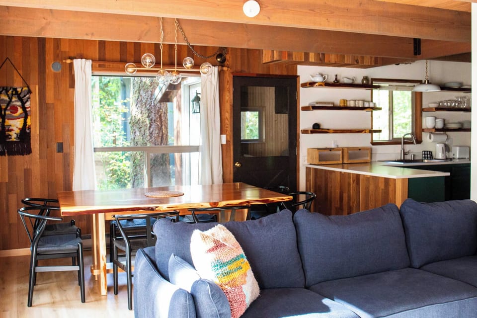 The open living, dining, and kitchen makes it easy to cook, dine, and relax