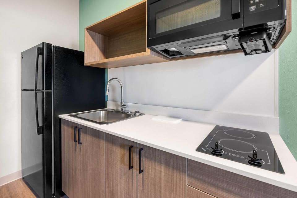 Studio, 2 Queen Beds, Non Smoking | Private kitchen | Full-size fridge, microwave, stovetop