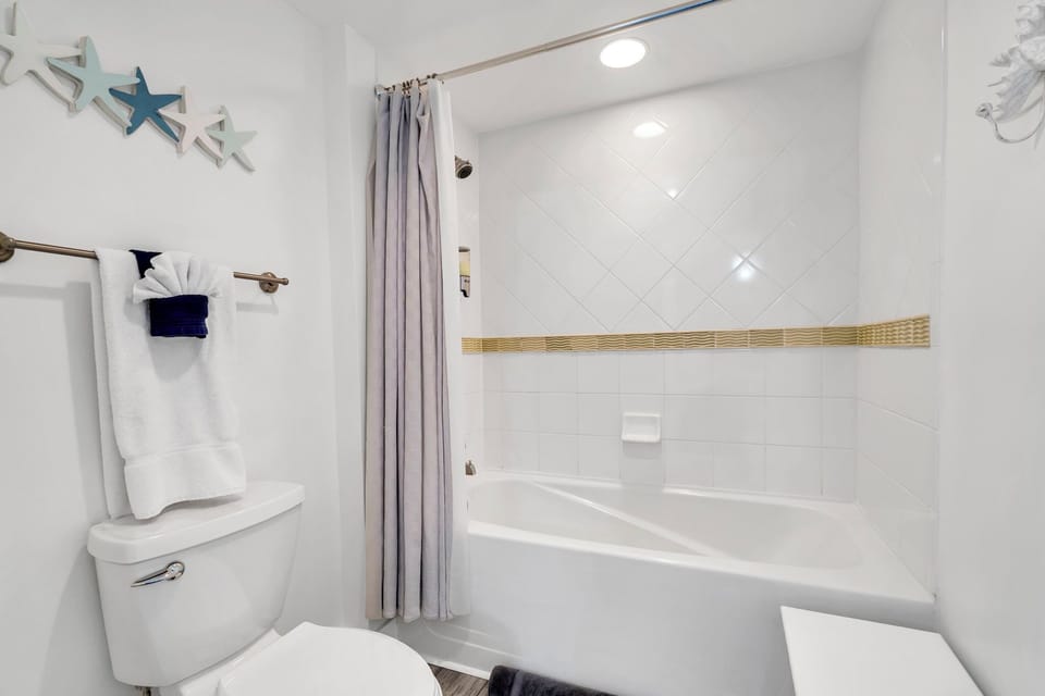 Primary bathroom with tub/shower combo
