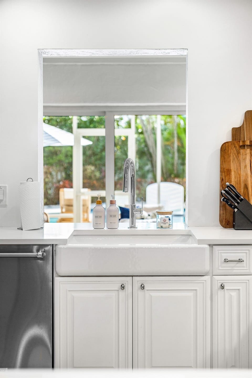 The kitchen sink overlooks the lush yard, making clean-up a little easier