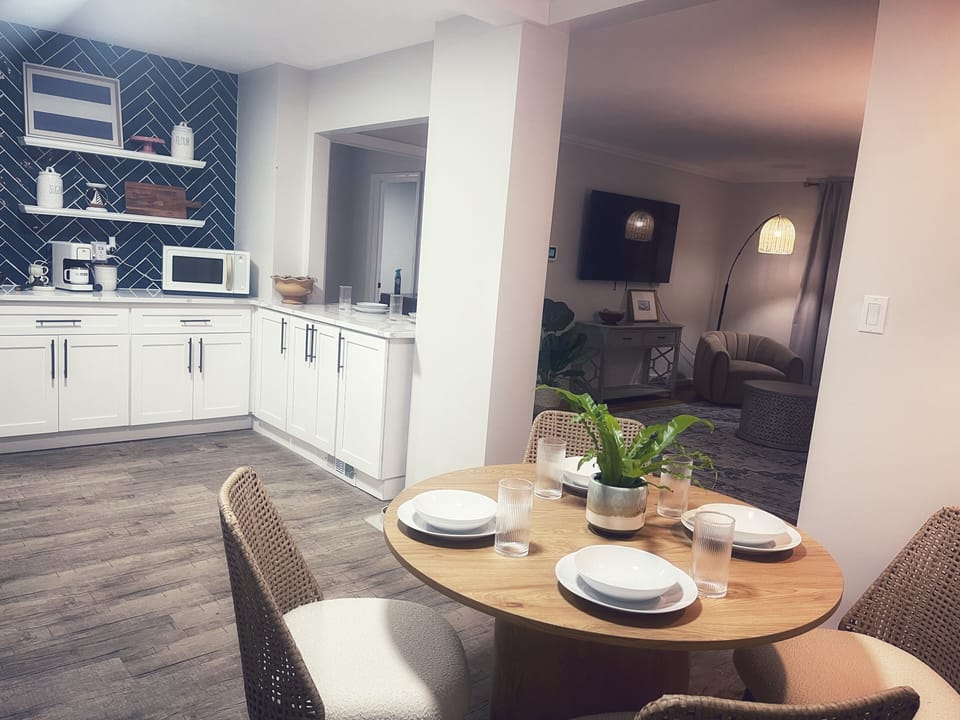 Kitchen includes coffee and espresso maker, microwave, air fryer, etc.