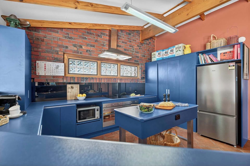 Generous fully equipped kitchen — perfect for cooking for a crowd.
