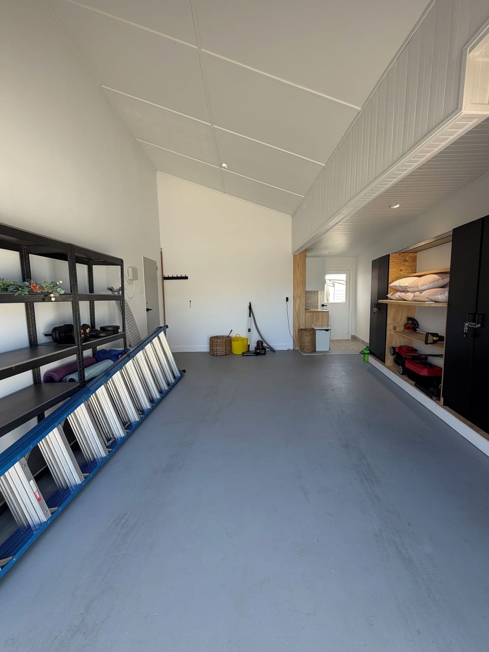Garage, Storage, Gym Equipment, Laundry, Workbench. Side access to Clothesline