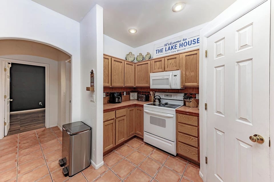 Warm, fully equipped kitchen with everything you need for home-cooked meals.
