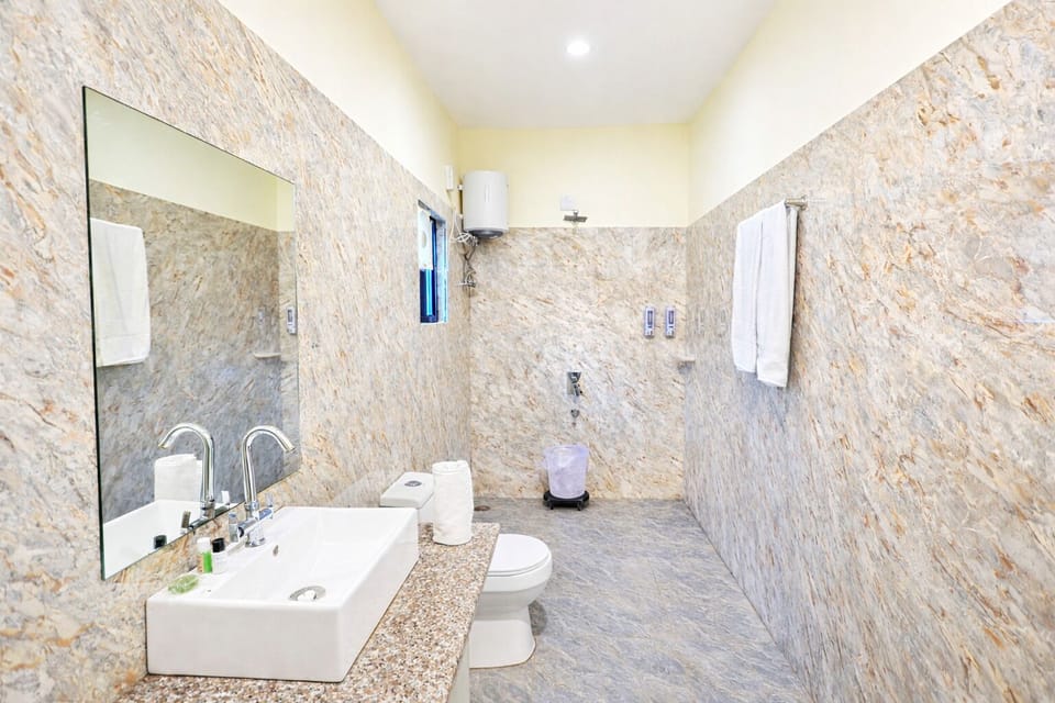 Premium Double Room, Patio | Bathroom | Shower, rainfall showerhead, free toiletries, bidet