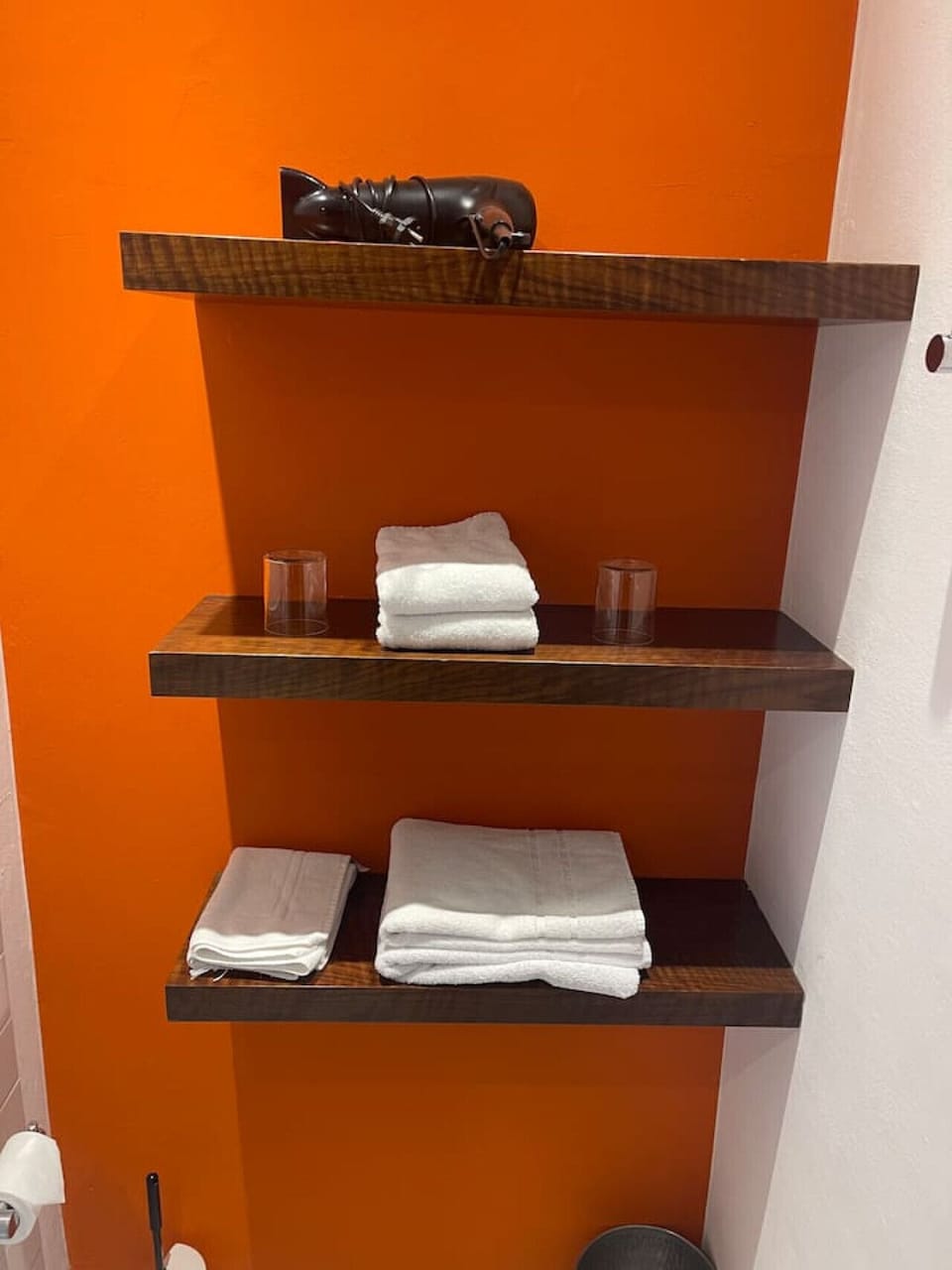 Modern Bathroom with Towels, Hairdryer and Body Soap