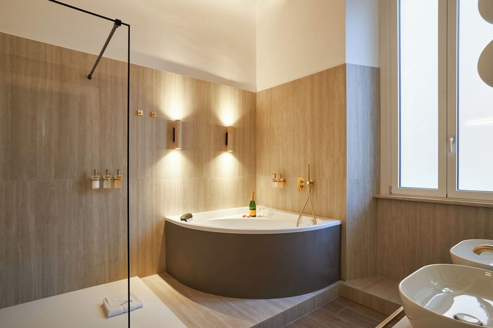 Luxury Triple Room, City View | Bathroom | Hair dryer, slippers, towels, soap