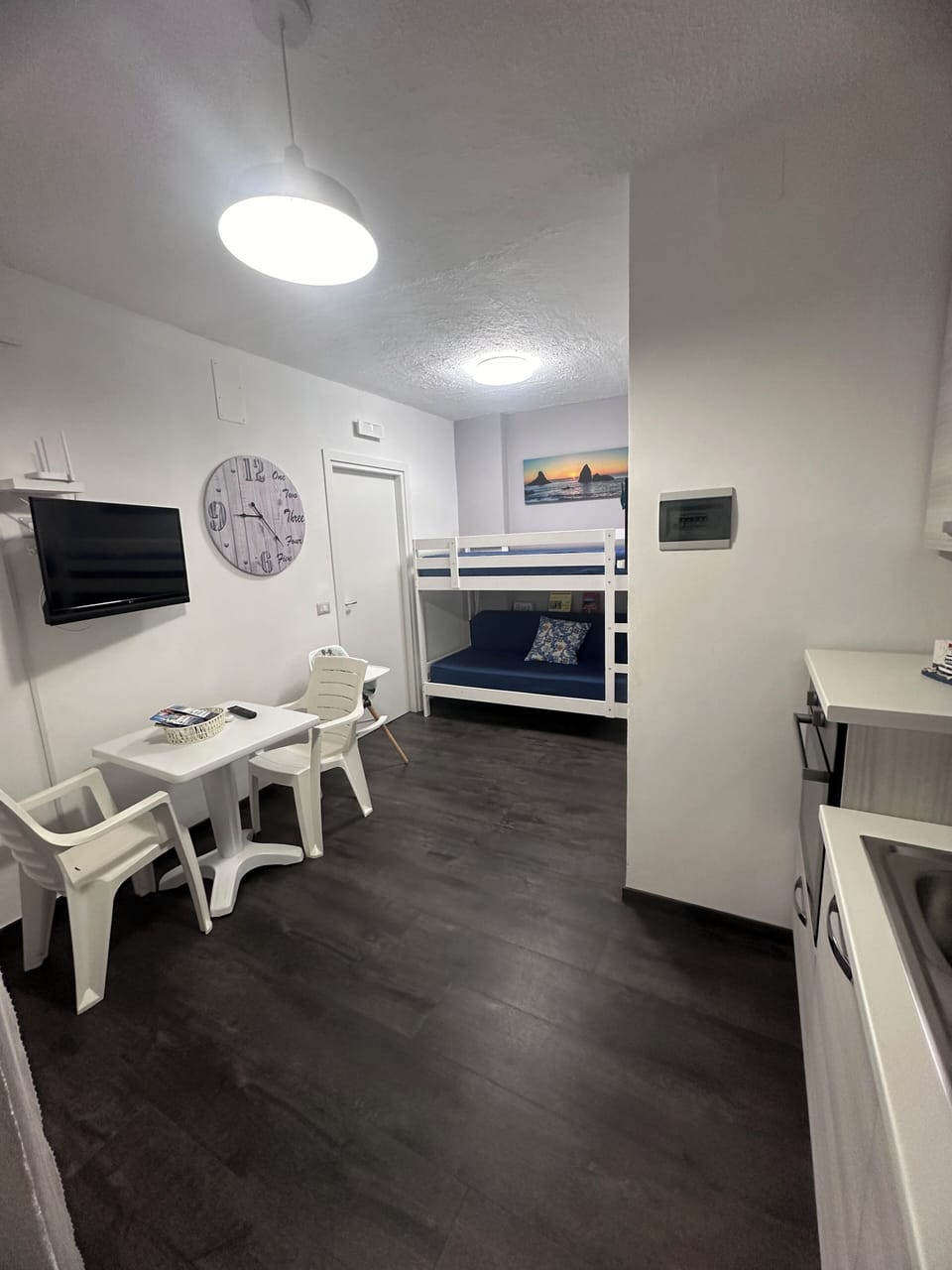 Family Apartment, Balcony, Sea View | Living area | Flat-screen TV