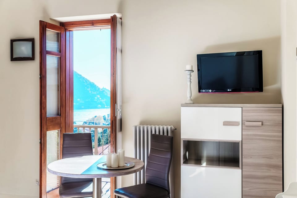 Apartment, Lake View | Living room | 30-inch TV with digital channels