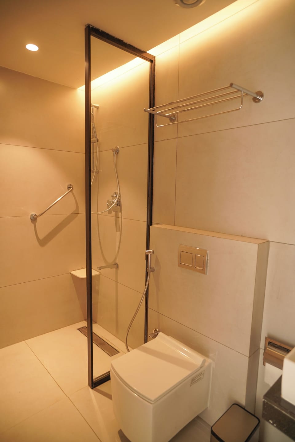 Shower, rainfall showerhead, designer toiletries, towels